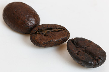 Roasted coffee beans  on white background,close up