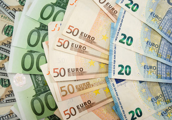 Beautifully folded dollars and euro banknotes. Money background.