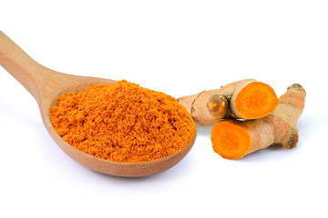Closeup Turmeric powder and root isolated on white.