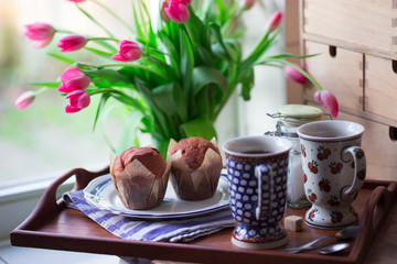 pink tulips in a vase