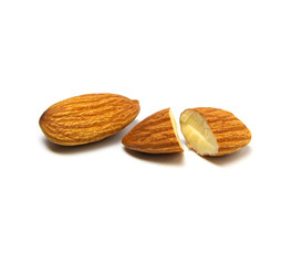 Closeup almonds nut cracked isolated on white background.
