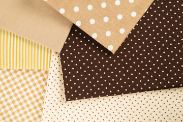 Obraz premium Mix of beige, white and brown cotton fabric.