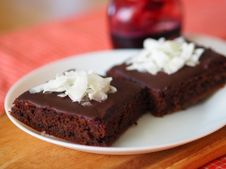 Fototapeta na wymiar Czech Chocolate cake pernik with coconut flakes and jam