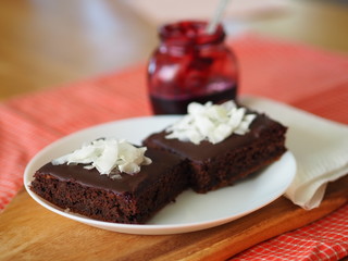 Czech Chocolate cake pernik with coconut flakes and jam