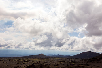 Fototapeta na wymiar Volcanic landscape near Volcano Tolbachik in the overcast weather. Kamchatka Peninsula, Russia