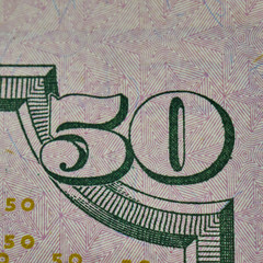 Detail of the fifty dollar banknote of the USA with the number fifty