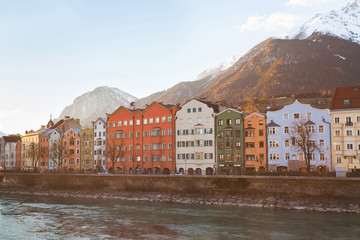 Innsbruck street, multicolored buildings in Austria, historical architecture houses on river Inn in Tyrol