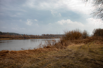 Fototapeta na wymiar View of the Oka River in Russia in the spring in cloudy weather, beautiful river landscape.