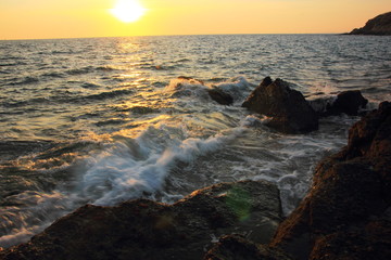 Rock and stone on the sunset at Khao Leam Ya ,Rayong Thailand,Amazing beach sunset. Long Exposure.