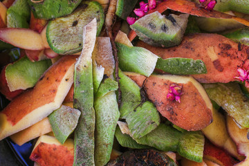 Cleaning and leftovers from potatoes and beets after cooking a meal or dish. Close-up of vegetable waste. Background.
