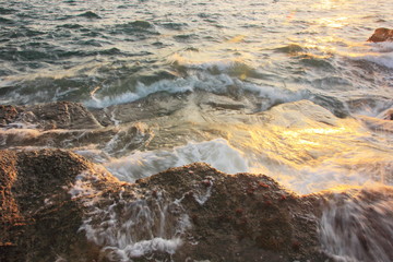 Rock and stone on the sunset at Khao Leam Ya ,Rayong Thailand,Amazing beach sunset. Long Exposure.
