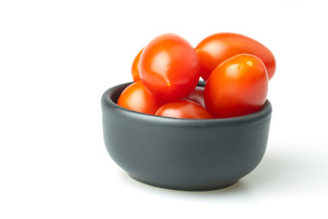 Cherry tomatoes in mini black bowl