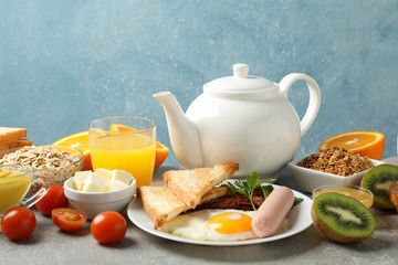 Delicious breakfast or lunch background. Grey table