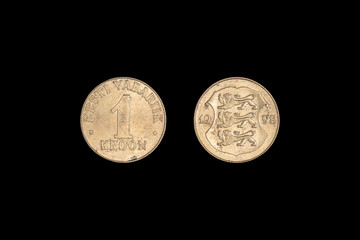An old Estonian coin isolated on black, 1 kroon 1998 year. Coinage, close-up.