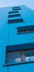 Fototapeta na wymiar Modern building with blue sky