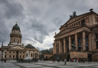 Gendarmenmarkt square in Berlin Germany, with dramatic clouds