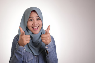 Muslim Woman Pointing Forward to Camera as Choosing You Concept