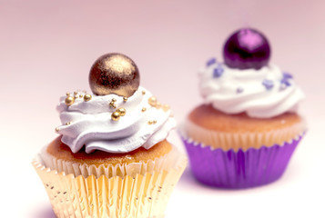 Sweet, colorful cupcakes decorated with sugar paste and cream. Concept of art paty.