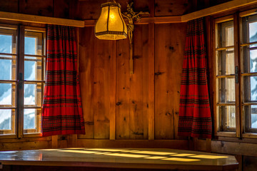 Inside of a wooden mountain hut