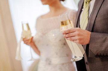 bride and groom with champaign