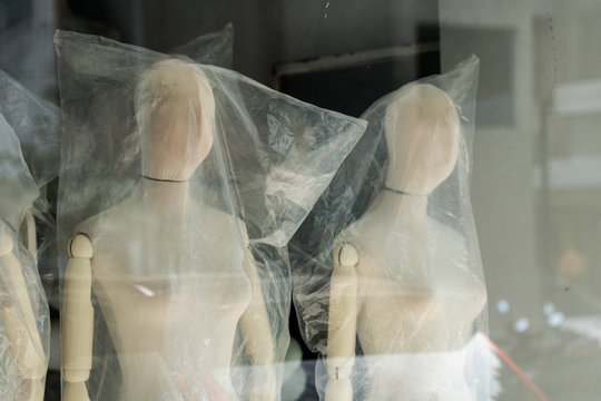Boutique display window with mannequins