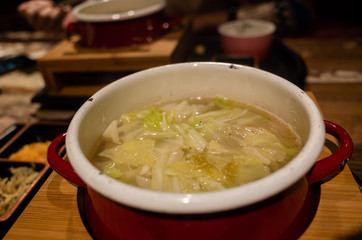 woman eating hot pot