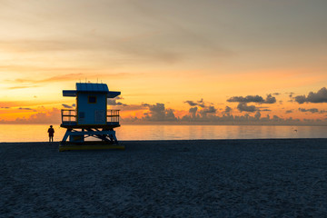 Iconic Miami Beach hut during sunrise with powerful clouds on a calm summer morning in Miami Beach (Miami, Florida, USA)