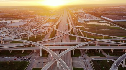 Witness the mesmerizing beauty of a stunning sunset at the intersection of Katy, Texas and the Houston 99 Toll Road Freeway.! - obrazy, fototapety, plakaty