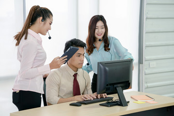 Successful Business Team Working In A Call Center
