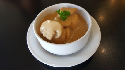Mushroom soup in a white cup
