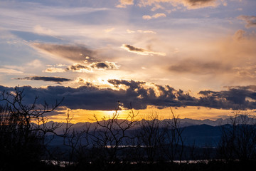 Beautiful sunset on the italian mountains in the Varese region.