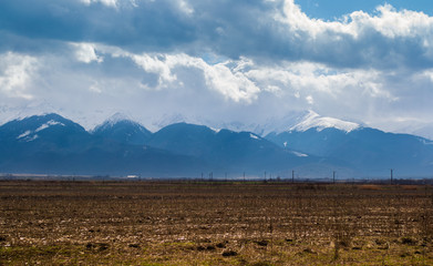Fototapeta premium Distant mountains with clouds