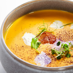 Pumpkin soup in bowl