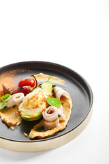 Grilled squid with avocado and egg