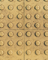 floor texture of a speed bump at the train station