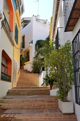 Stepped alley in Benahavis, Andalusia, Spain - 329619532