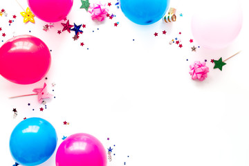 Party concept. Colorful balloons and confetti on white background top-down frame copy space