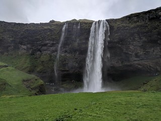 Fototapeta premium Waterfalls, black sand beaches and cliffs