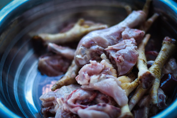 man cooking chicken in a pan in kitchen, Indian Non veg food