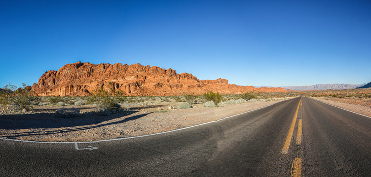 Panoramic picture of deep red colored rock formations in the Valley of Fire state park near Las Vegas in winter