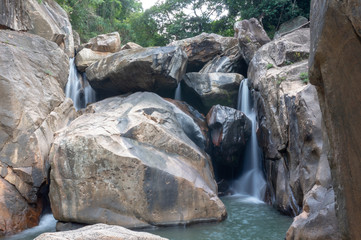 Fototapeta na wymiar Ba Ho Waterfall slow shutter speed. Beautiful nature, Vietnam, Nha Trang.