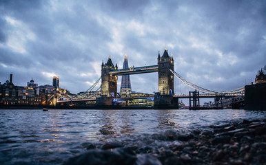 Fototapeta na wymiar London evening cityscape with Tower Bridge and the Shard. Low wide angle view.