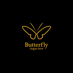 Golden butterfly on black background.logo template for beauty salon,spa salon,etc.