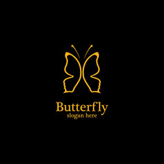 Golden butterfly on black background.logo template for beauty salon,spa salon,etc.