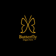 Golden butterfly on black background.logo template for beauty salon,spa salon,etc.