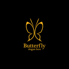 Golden butterfly on black background.logo template for beauty salon,spa salon,etc.