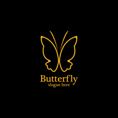 Golden butterfly on black background.logo template for beauty salon,spa salon,etc.