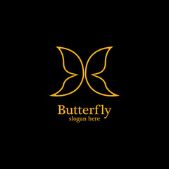 Golden butterfly on black background.logo template for beauty salon,spa salon,etc.