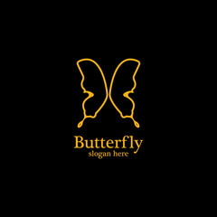 Golden butterfly on black background.logo template for beauty salon,spa salon,etc.