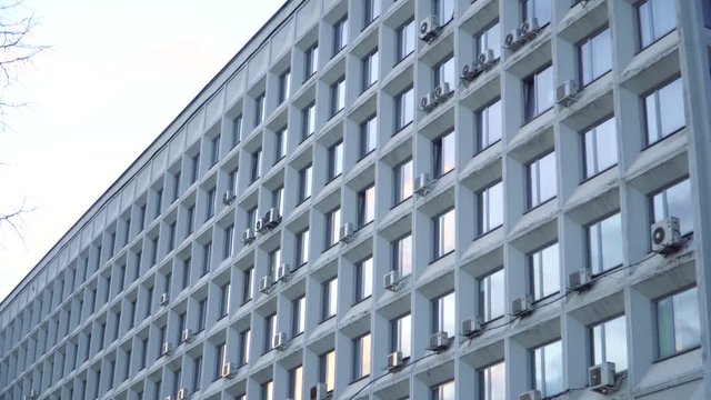 The Soviet administrative building with a perfect square Windows. Grandiose buildings of the Soviet Union. House of design organizations . Perspective.